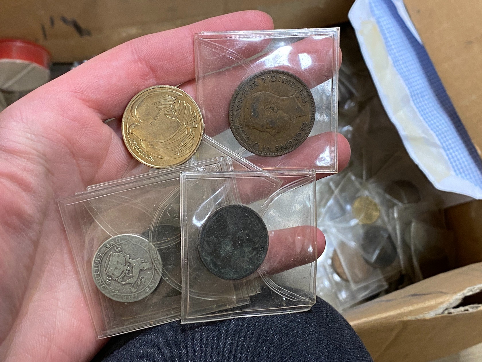 A box of assorted coins, mostly George V to QEII